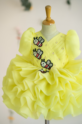 Fluffy yellow dress with bees